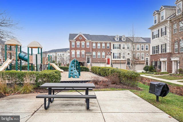 view of community with a residential view and playground community