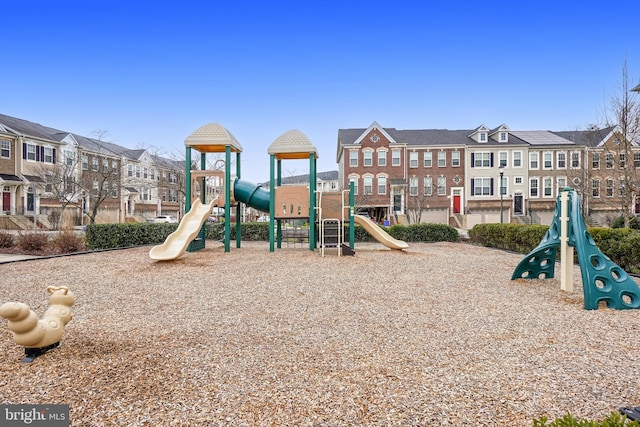 community jungle gym featuring a residential view