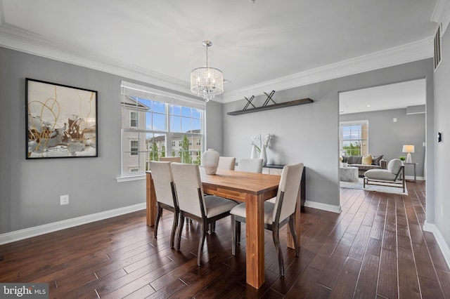 dining area with a chandelier, crown molding, baseboards, and dark wood-style floors