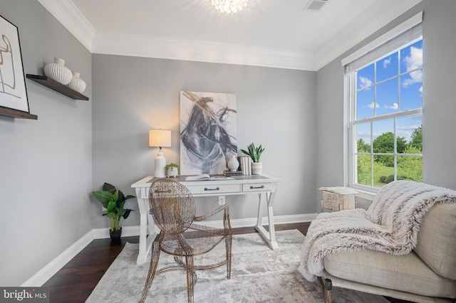 office area featuring crown molding, healthy amount of natural light, wood finished floors, and baseboards