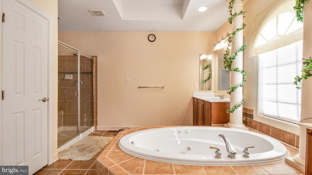 full bathroom with tile patterned floors, a stall shower, visible vents, a tub with jets, and vanity