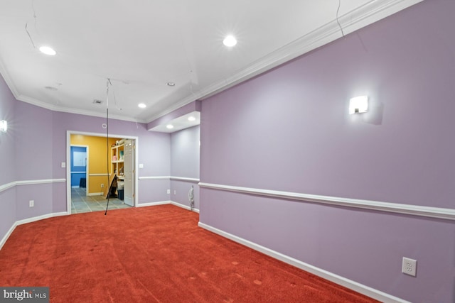 spare room featuring baseboards, carpet floors, recessed lighting, and ornamental molding