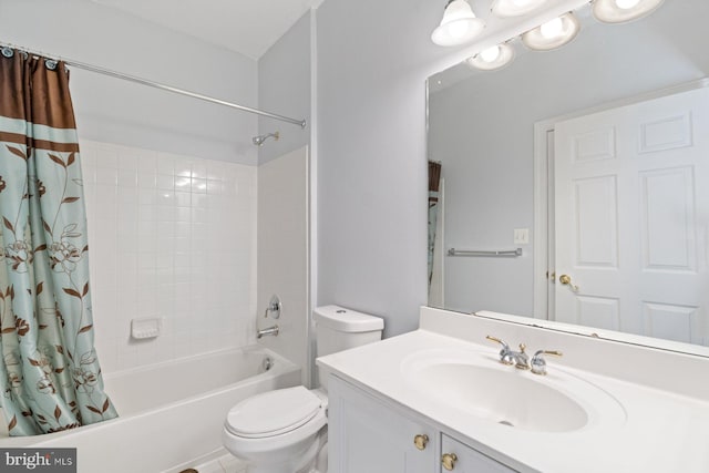 bathroom with toilet, vanity, and shower / bath combo with shower curtain