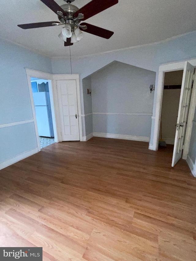3418 Englewood St, Philadelphia, PA 19149 - additional living space with light wood-type flooring, a ceiling fan, and baseboards