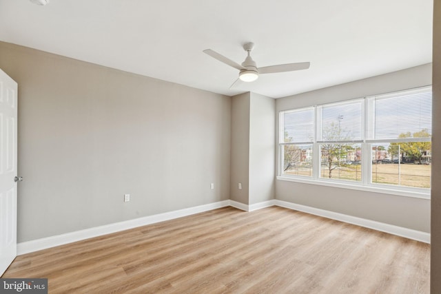 2954 Cedar St, Philadelphia, PA 19134 - empty room featuring light wood finished floors, baseboards, and a ceiling fan