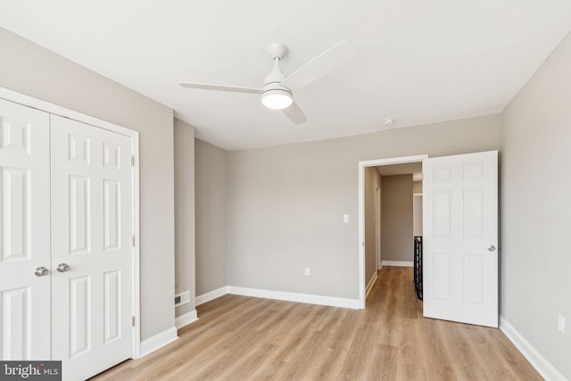 2954 Cedar St, Philadelphia, PA 19134 - unfurnished bedroom featuring light wood-style flooring, a closet, and baseboards