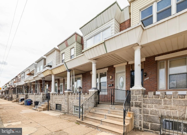 2954 Cedar St, Philadelphia, PA 19134 - exterior space featuring covered porch and brick siding