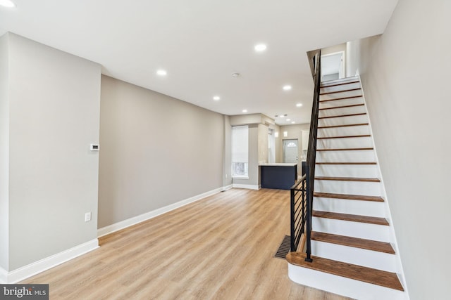 2954 Cedar St, Philadelphia, PA 19134 - staircase featuring baseboards, wood finished floors, and recessed lighting