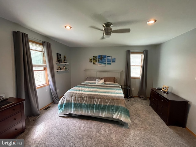 bedroom with ceiling fan, light carpet, visible vents, and recessed lighting