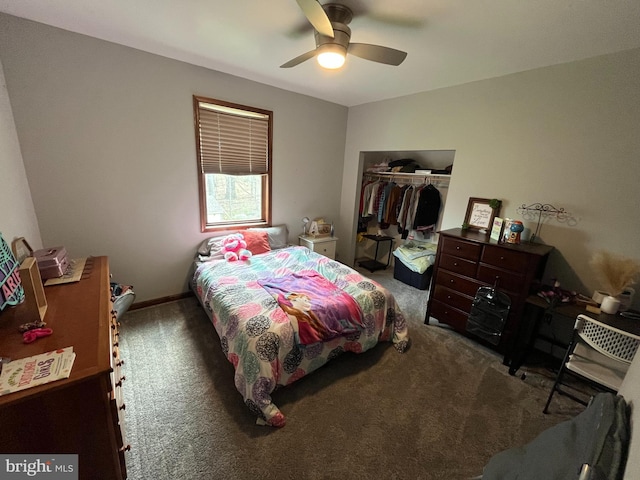 carpeted bedroom featuring a ceiling fan and a closet