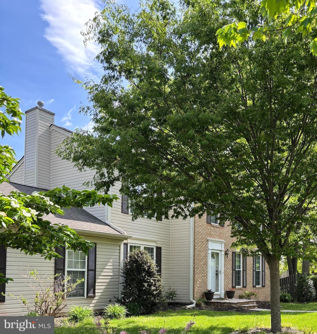 1312 Treasure Dr, Odenton, MD 21113 - view of front of house featuring a front lawn and brick siding