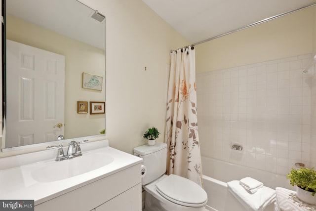 bathroom featuring shower / bath combination with curtain, vanity, visible vents, and toilet