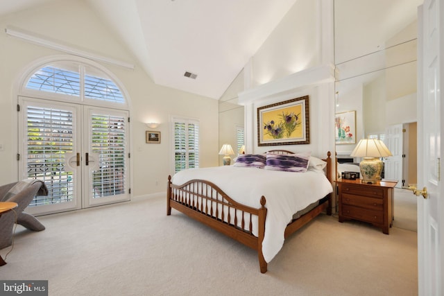 bedroom featuring visible vents, high vaulted ceiling, access to outside, and light colored carpet