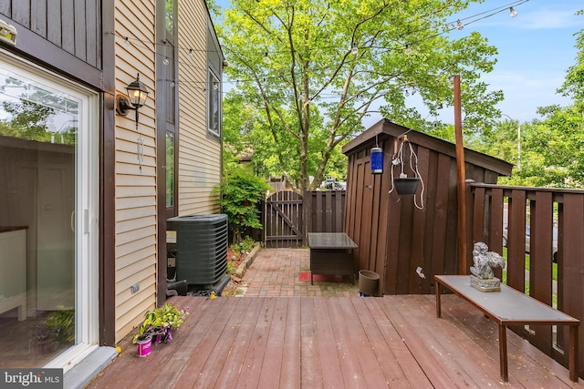 7329 Split Rail Ln, Laurel, MD 20707 - wooden deck featuring central AC unit and a gate