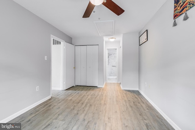 7329 Split Rail Ln, Laurel, MD 20707 - unfurnished bedroom featuring wood finished floors, attic access, a closet, baseboards, and a ceiling fan