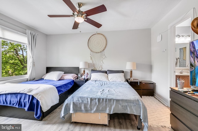 7329 Split Rail Ln, Laurel, MD 20707 - bedroom featuring wood finished floors, a ceiling fan, and baseboards