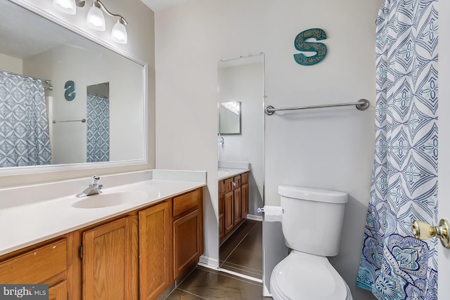 7329 Split Rail Ln, Laurel, MD 20707 - full bathroom with toilet, vanity, and tile patterned floors