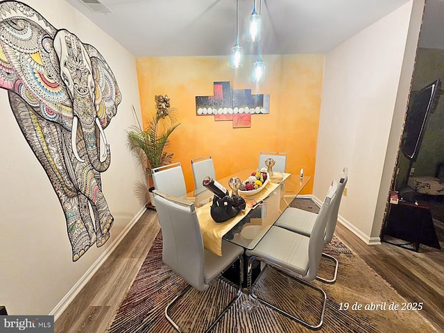 7329 Split Rail Ln, Laurel, MD 20707 - dining area with wood finished floors and baseboards