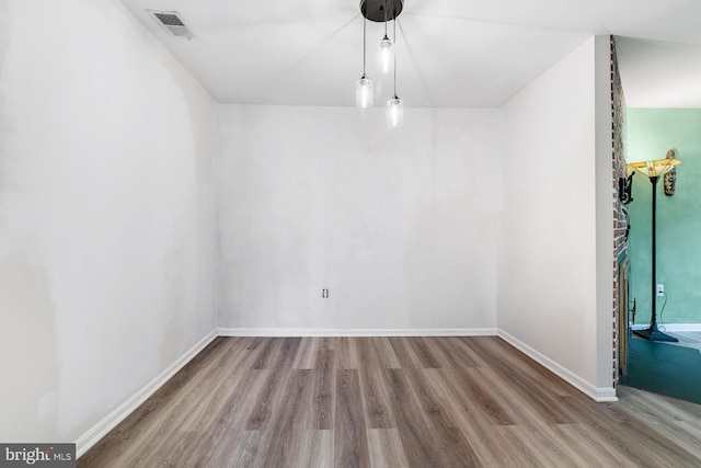 7329 Split Rail Ln, Laurel, MD 20707 - unfurnished dining area with wood finished floors and baseboards