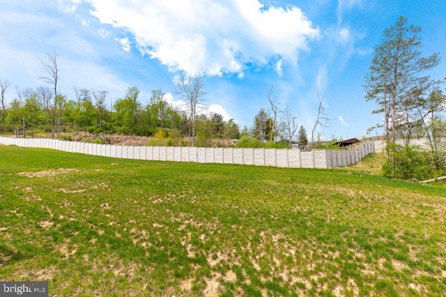 view of yard featuring fence