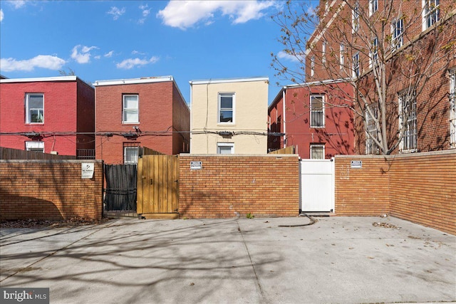 exterior space with a gate and fence