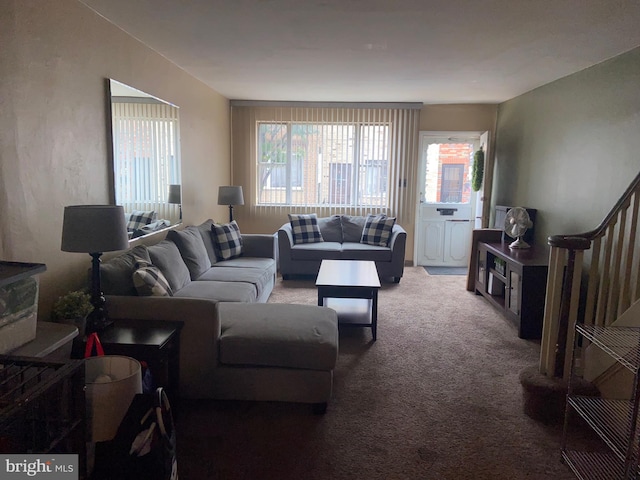 919 Dudley St, Philadelphia, PA 19148 - living area with carpet flooring, healthy amount of natural light, and stairs