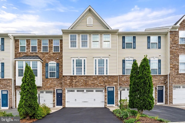 172 Trout Lily Dr, Lake Frederick, VA 22630 - townhome / multi-family property featuring driveway, a garage, and stone siding