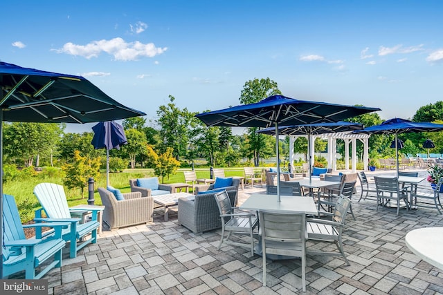 view of patio / terrace with outdoor lounge area and outdoor dining space