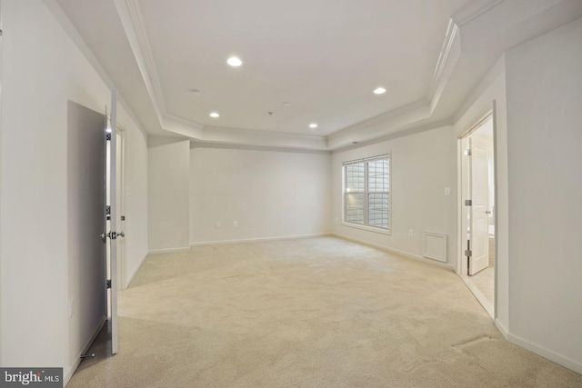 1539 Rabbit Hollow Pl, Silver Spring, MD 20906 - unfurnished room with ornamental molding, a tray ceiling, light carpet, recessed lighting, and baseboards