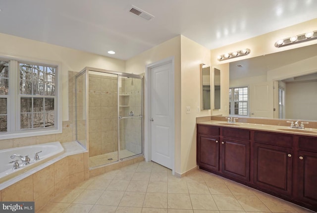 1539 Rabbit Hollow Pl, Silver Spring, MD 20906 - bathroom with tile patterned floors, a bath, a stall shower, and double vanity