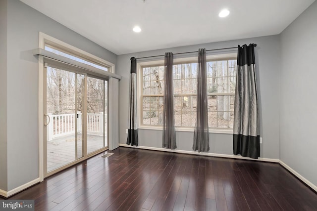 1539 Rabbit Hollow Pl, Silver Spring, MD 20906 - unfurnished room featuring baseboards, healthy amount of natural light, wood finished floors, and recessed lighting