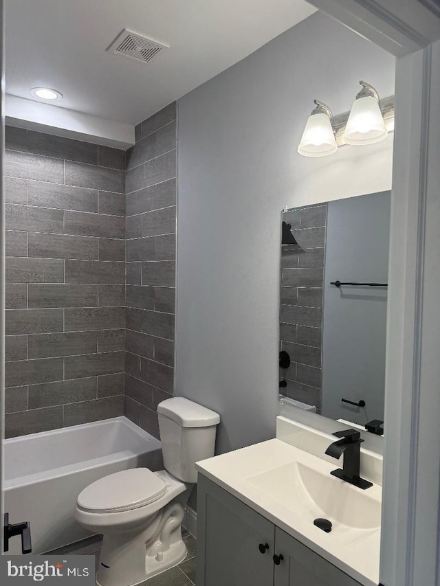 full bath featuring toilet, vanity, tub / shower combination, and recessed lighting