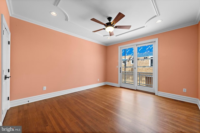 empty room featuring recessed lighting, crown molding, a ceiling fan, baseboards, and wood finished floors