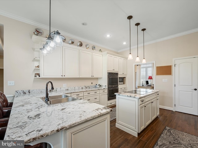 kitchen with black electric cooktop, stainless steel double oven, ornamental molding, a sink, and dark wood-style flooring