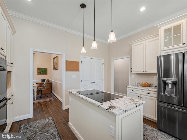 kitchen with ornamental molding, stainless steel refrigerator with ice dispenser, black electric stovetop, and white cabinetry
