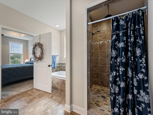 full bath featuring a bath, tile patterned floors, ensuite bath, and a stall shower