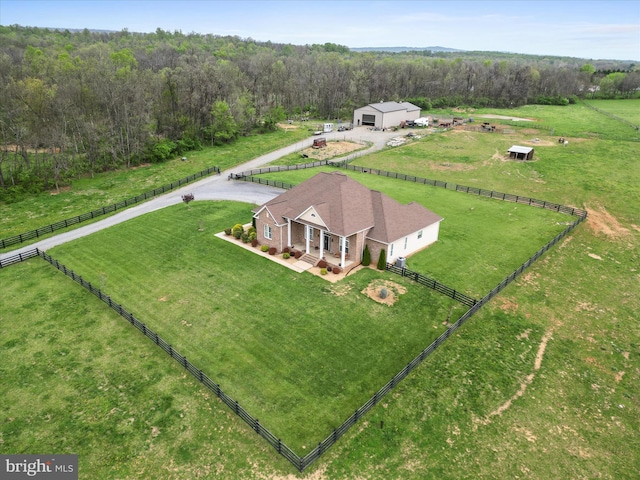 aerial view with a view of trees and a rural view