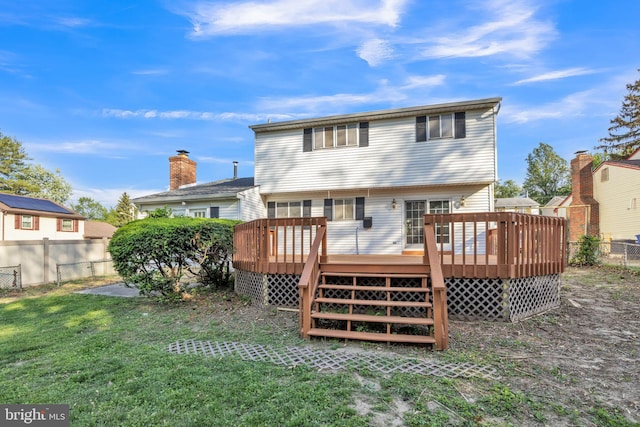 back of property with a deck