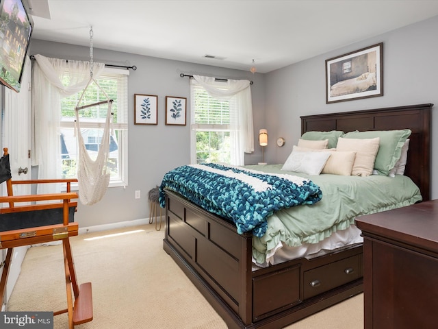 3325 Cedar Dr, Edgewater, MD 21037 - bedroom with light colored carpet, baseboards, and visible vents