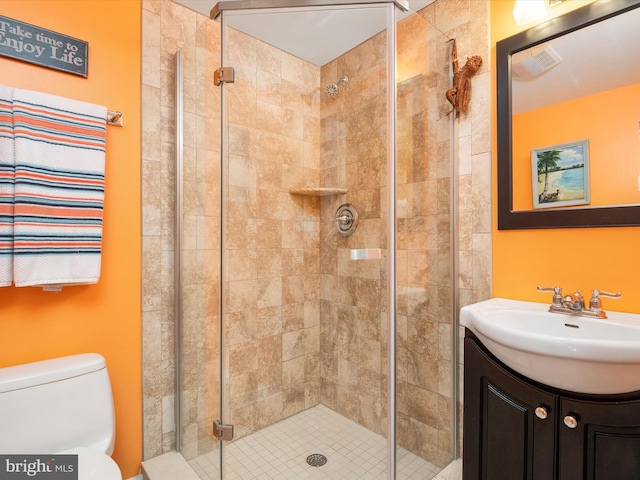 3325 Cedar Dr, Edgewater, MD 21037 - bathroom featuring vanity, toilet, visible vents, and a stall shower