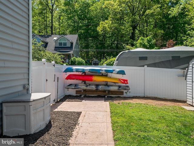 3325 Cedar Dr, Edgewater, MD 21037 - view of parking / parking lot with a gate and fence