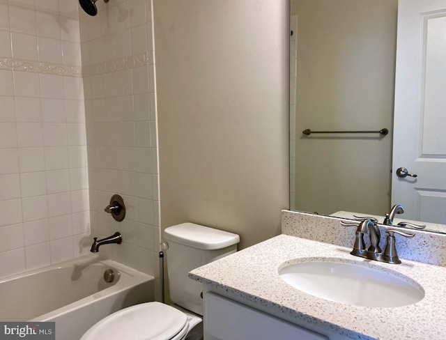 full bathroom featuring vanity, shower / bath combination, and toilet