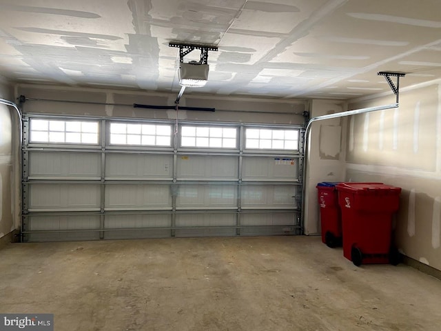 garage featuring a garage door opener