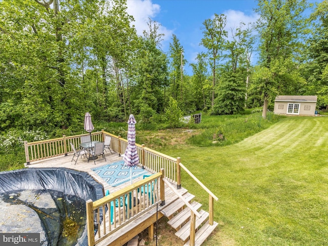 13240 Edgemont Rd, Smithsburg, MD 21783 - wooden deck featuring a yard, an outdoor structure, and outdoor dining space