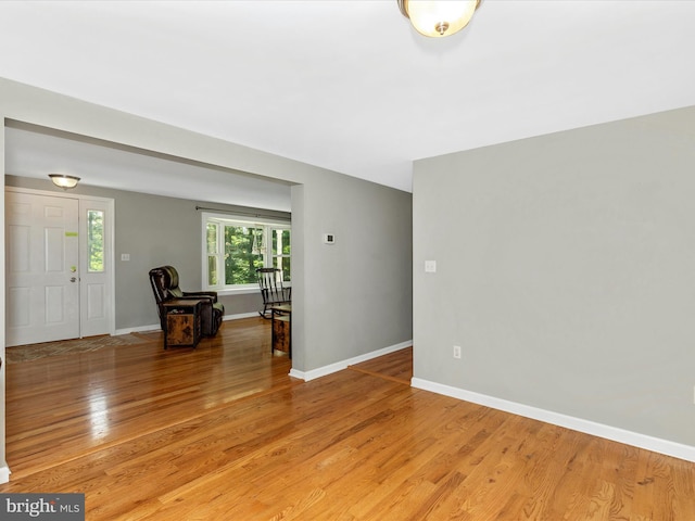 13240 Edgemont Rd, Smithsburg, MD 21783 - unfurnished living room featuring baseboards and light wood-style flooring