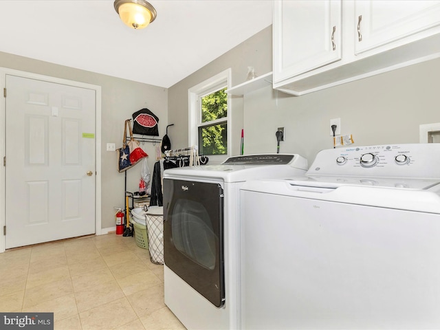 13240 Edgemont Rd, Smithsburg, MD 21783 - washroom featuring cabinet space, independent washer and dryer, and light tile patterned flooring