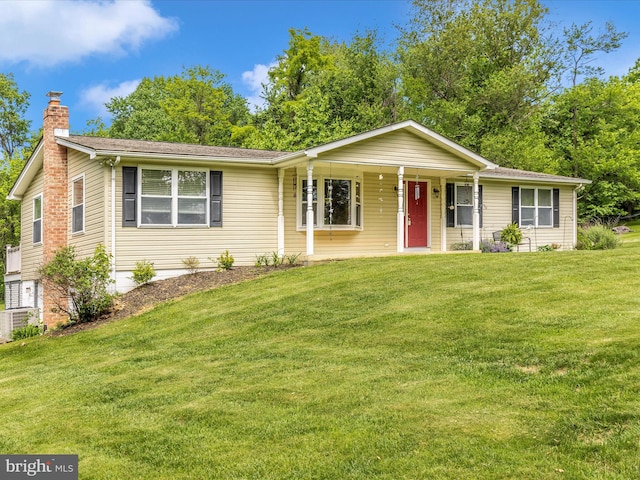 13240 Edgemont Rd, Smithsburg, MD 21783 - ranch-style home with a chimney, a front lawn, central AC unit, and a porch