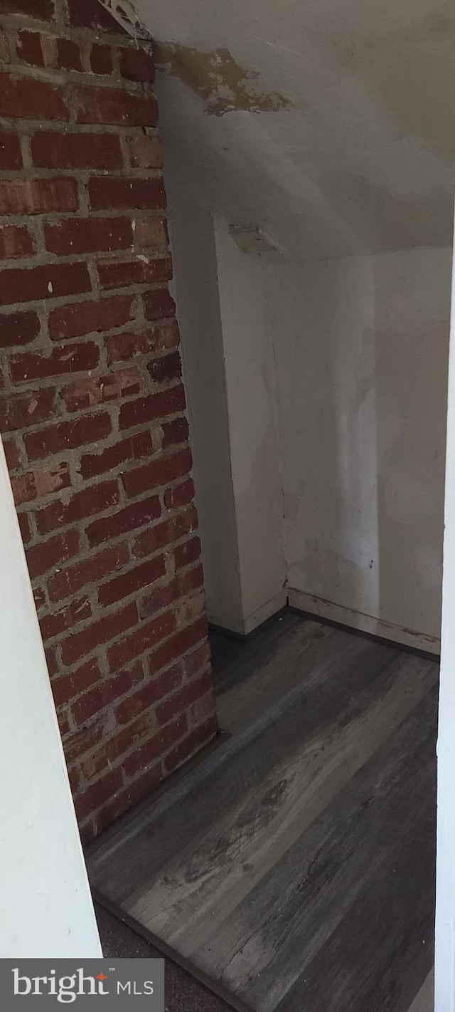 empty room featuring wood finished floors