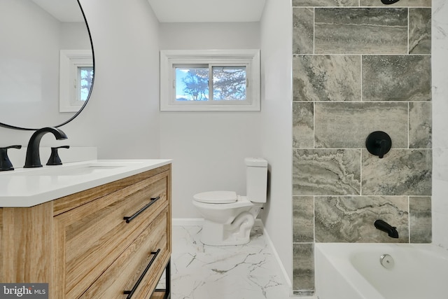 bathroom featuring toilet, baseboards, shower / bath combination, marble finish floor, and vanity
