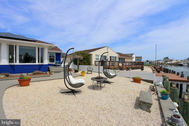 view of play area featuring an outdoor fire pit